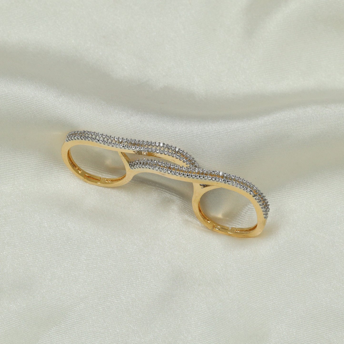 twin‑array finger ring arrangement emphasizing symmetry