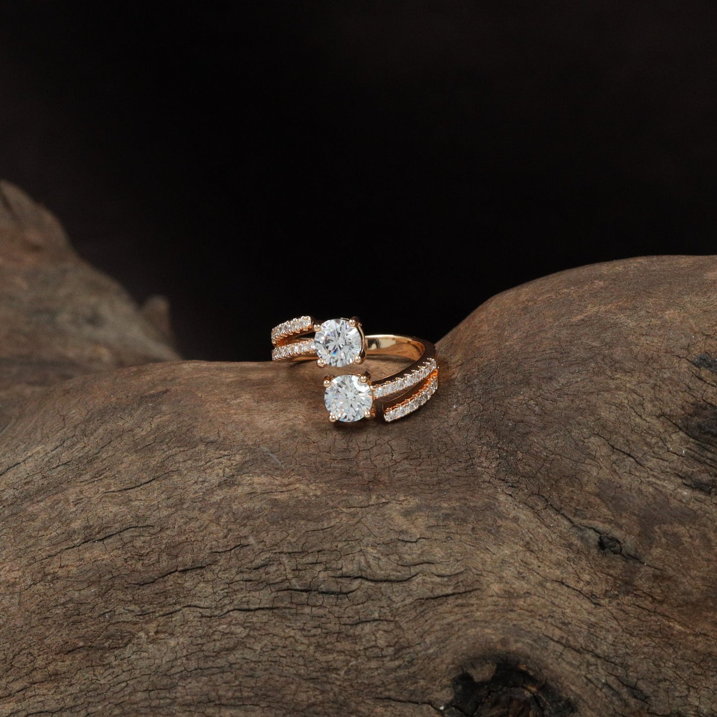 Orbit twinâ€‘frame finger ring design with graceful curvature