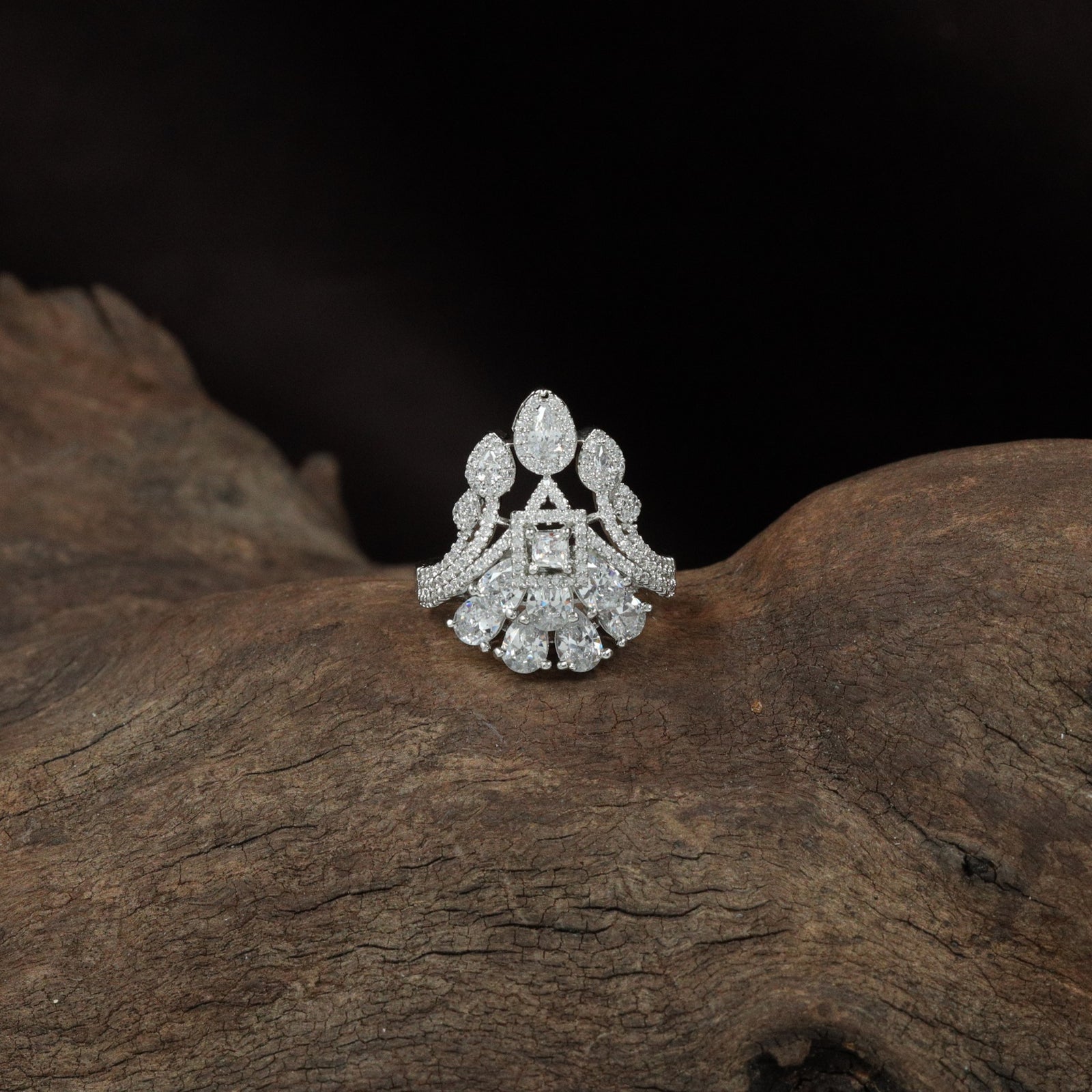 Segment floral form finger ring craft with intricate lattice detailing