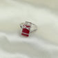 Orbit emeraldâ€‘diamond frame finger ring design with graceful curvature