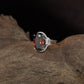 Grand Orbit Finger Ring with Decorative Oval Frame