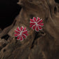 Rhodium Studs With Sculpted Floral Spokes