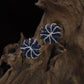 Rhodium Studs With Sculpted Floral Spokes