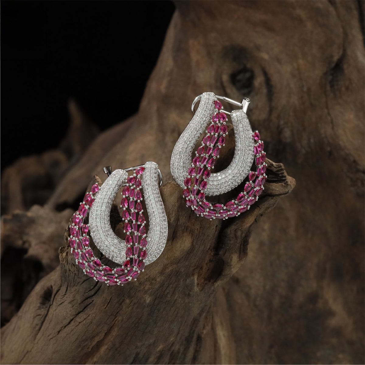 Twisted loop Rhodium Studs with ornamental detailing