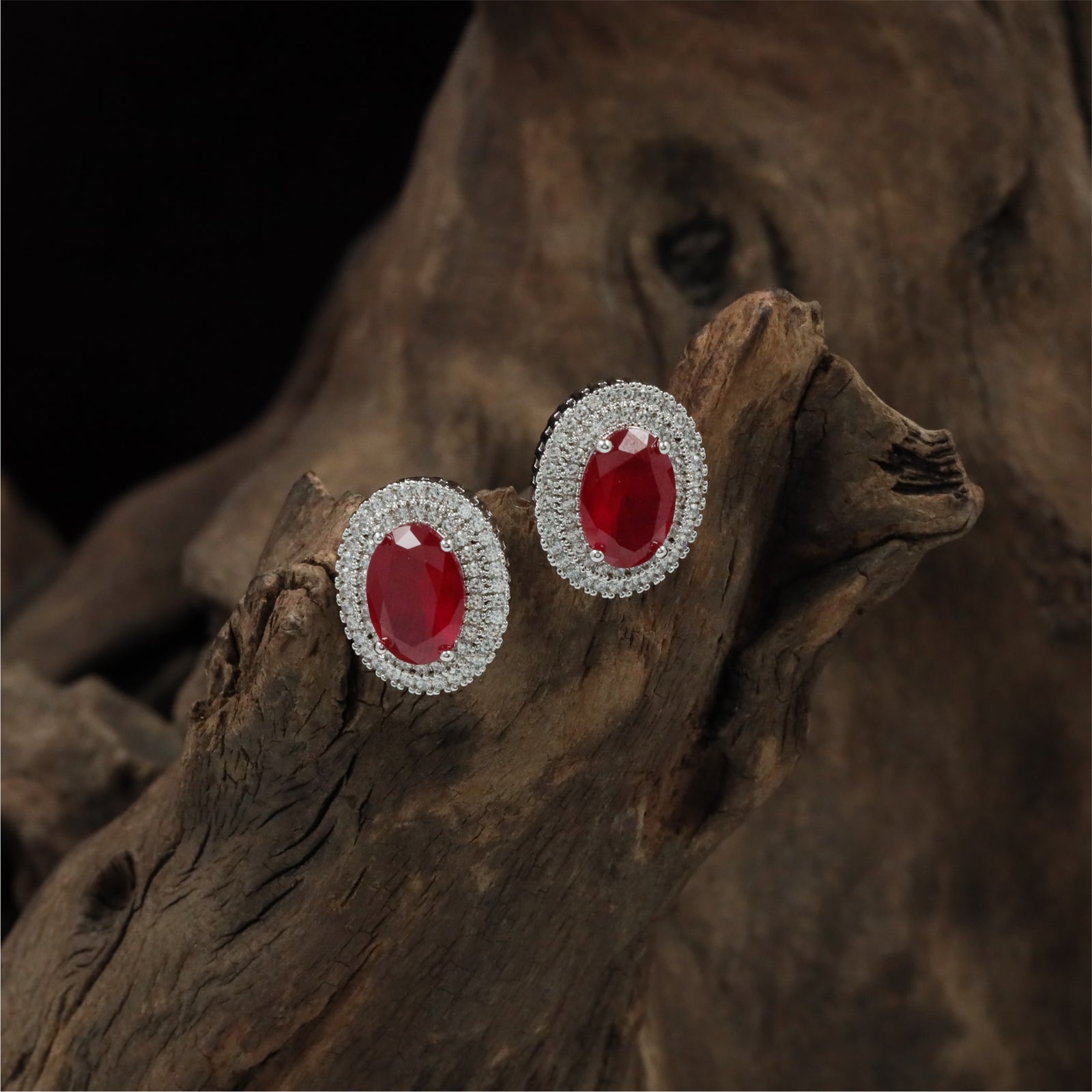 Signature Oval Halo Rhodium Stud with Layered Circular Detailing