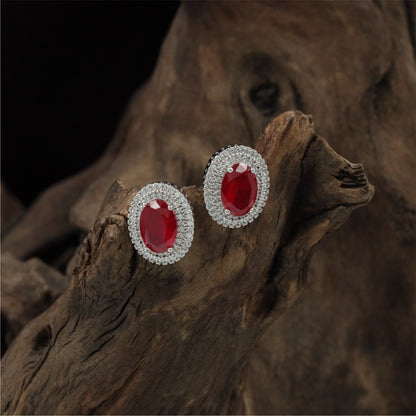 Signature Oval Halo Rhodium Stud with Layered Circular Detailing