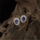 Signature Oval Halo Rhodium Stud with Layered Circular Detailing