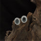 Signature Oval Halo Rhodium Stud with Layered Circular Detailing