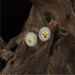 Signature Oval Halo Rhodium Stud with Layered Circular Detailing