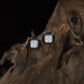 Cushion Frame Rhodium Stud with Textured Border Detailing
