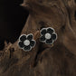 Radiant Blossom Rhodium Stud with Structured Floral Arrangement