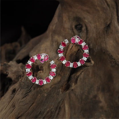 Open Circle Rhodium Studs With Alternating Oval Accents