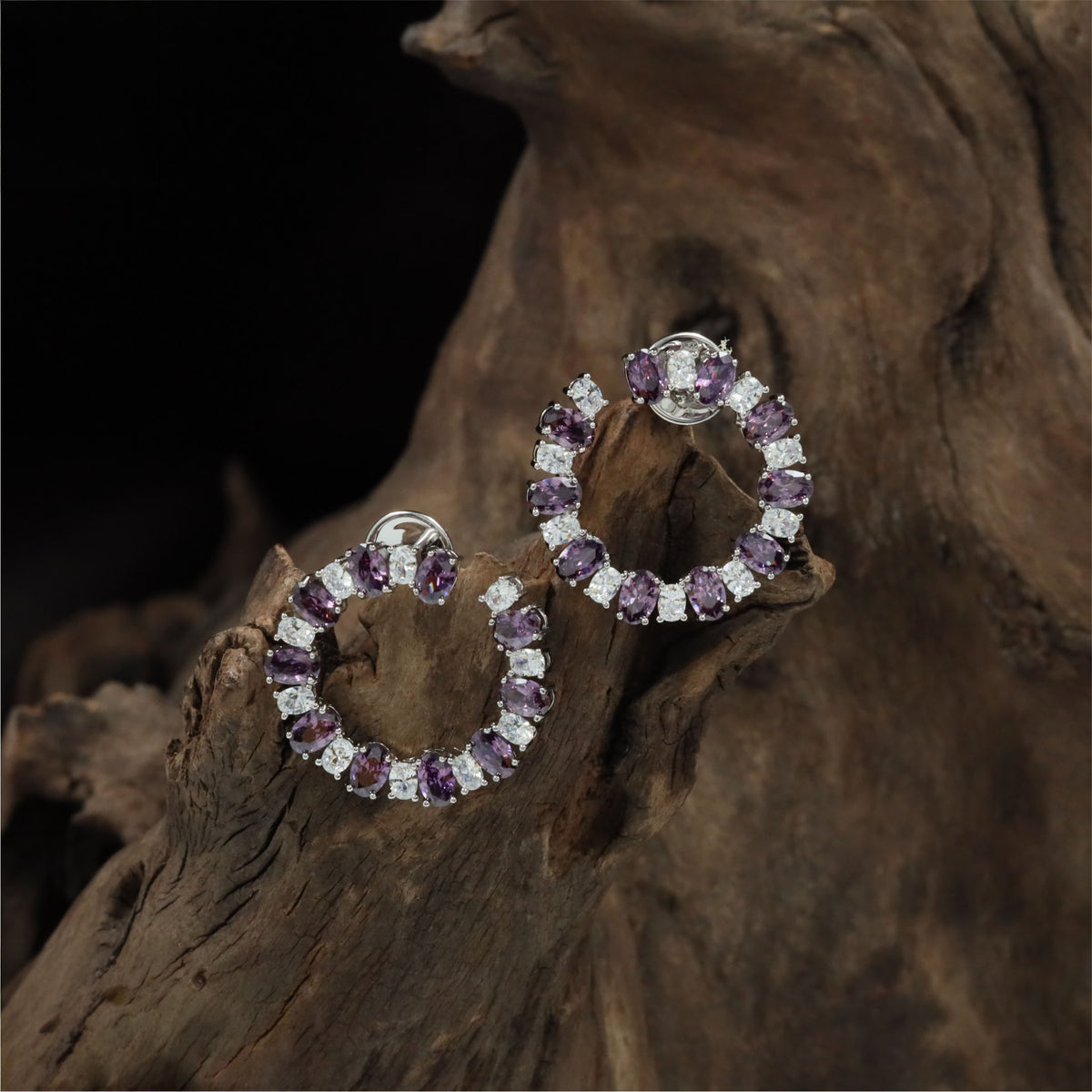 Open Circle Rhodium Studs With Alternating Oval Accents