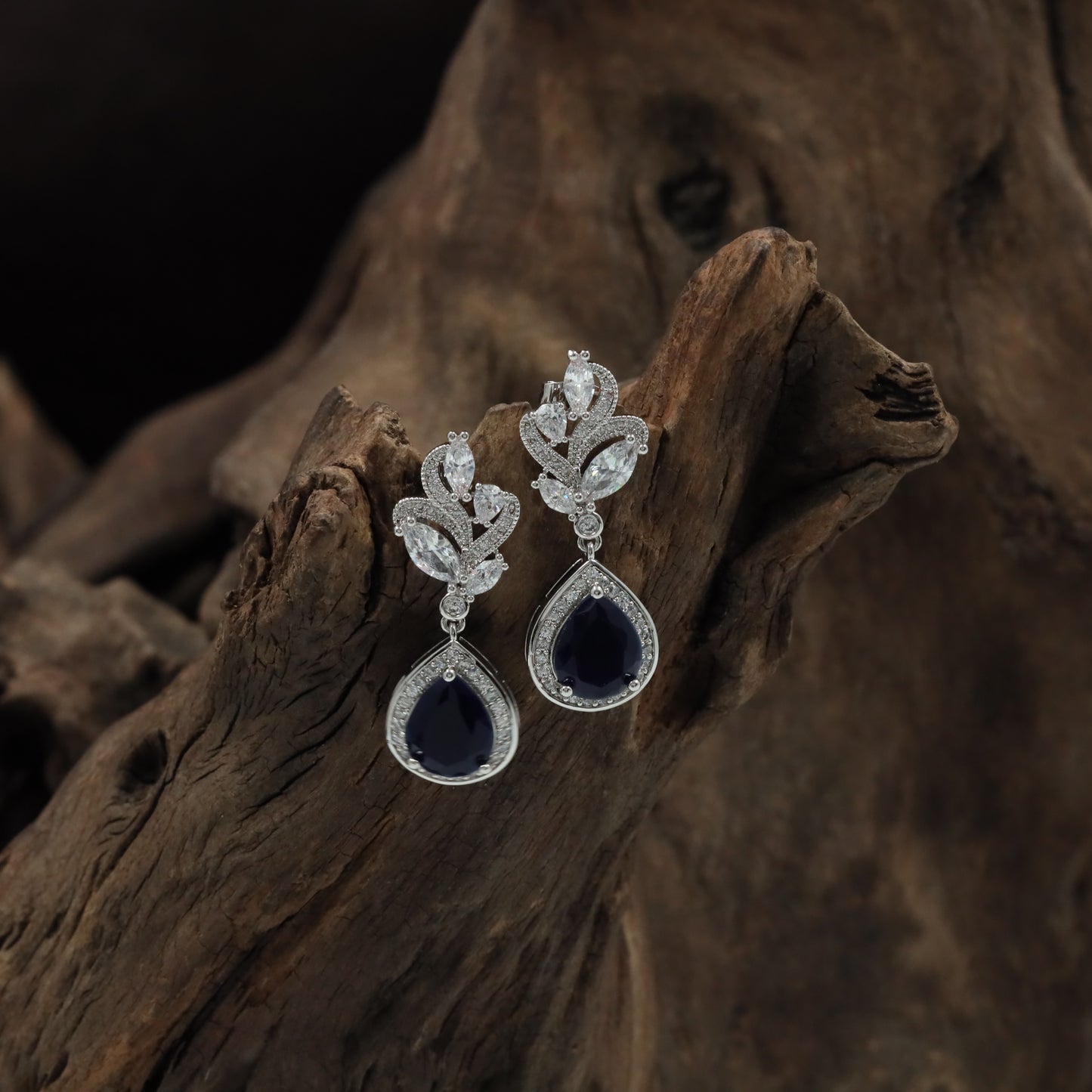 Jewel Drop Rhodium Hanging with Layered Border Arrangement
