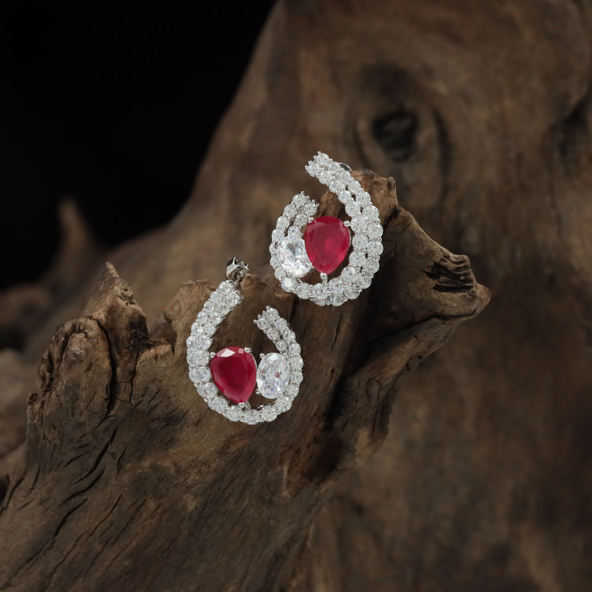 Sculpted Swirl Rhodium Studs With Asymmetrical Curves