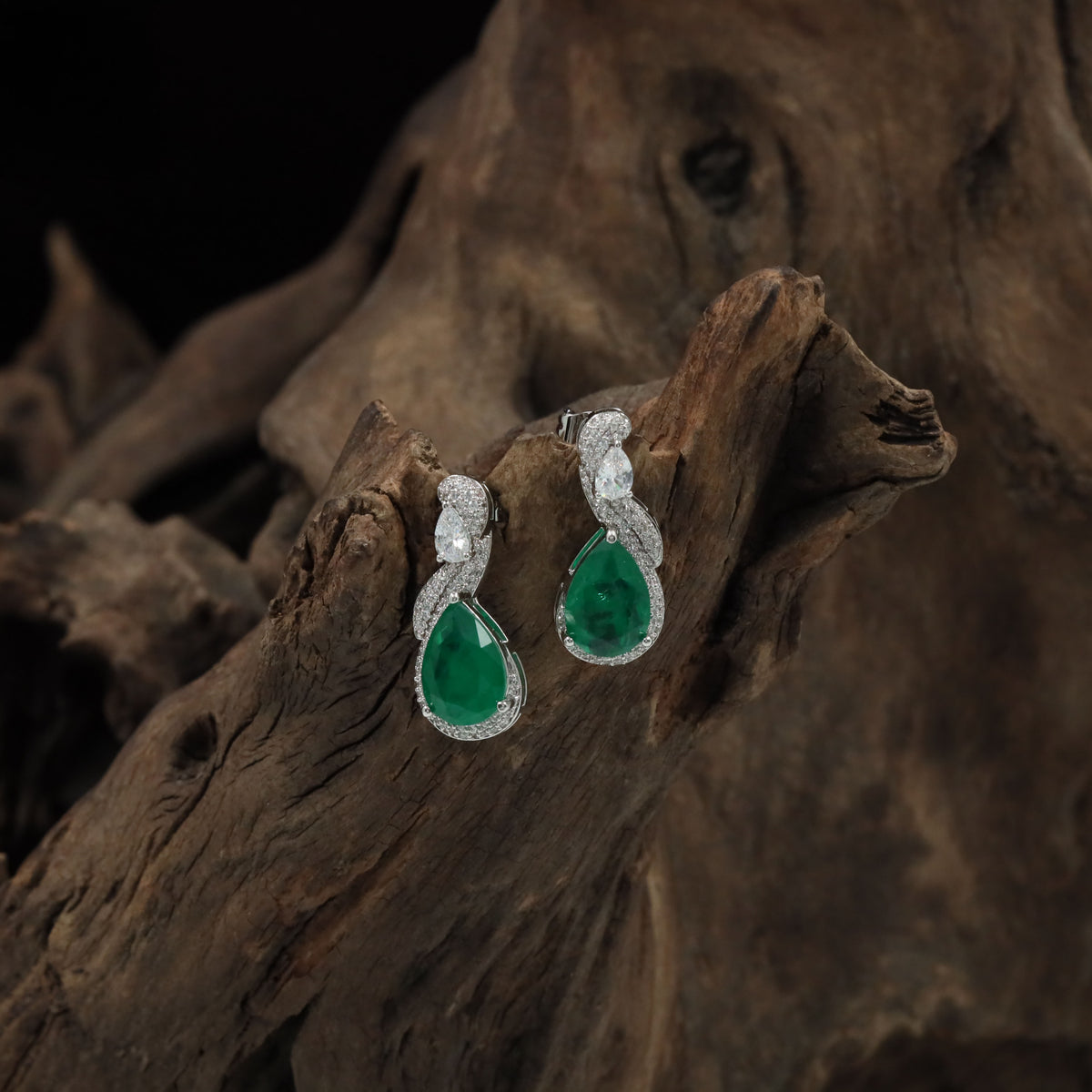 Contemporary Drop Rhodium Studs With Twisted Silhouette