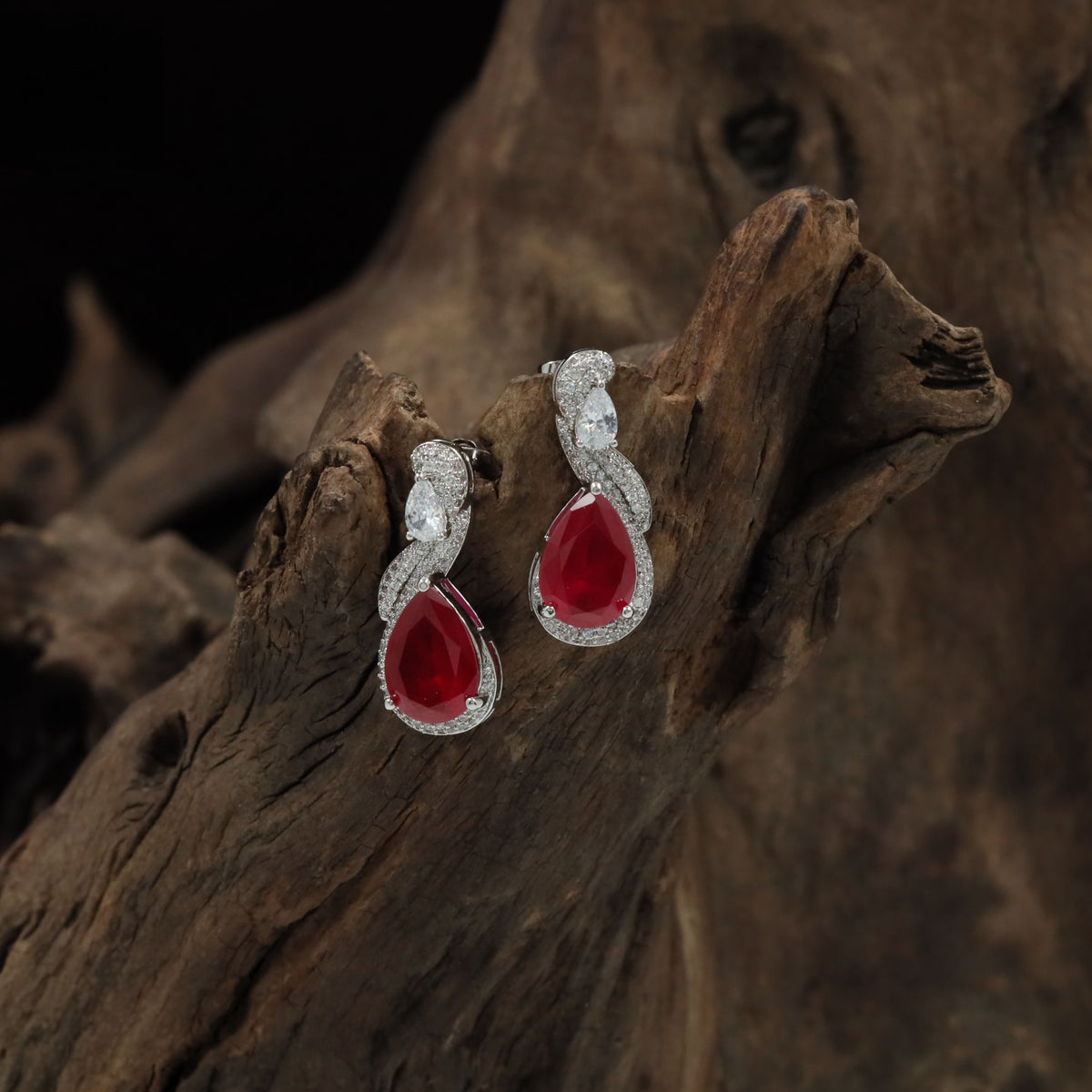 Contemporary Drop Rhodium Studs With Twisted Silhouette