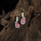 Contemporary Drop Rhodium Studs With Twisted Silhouette