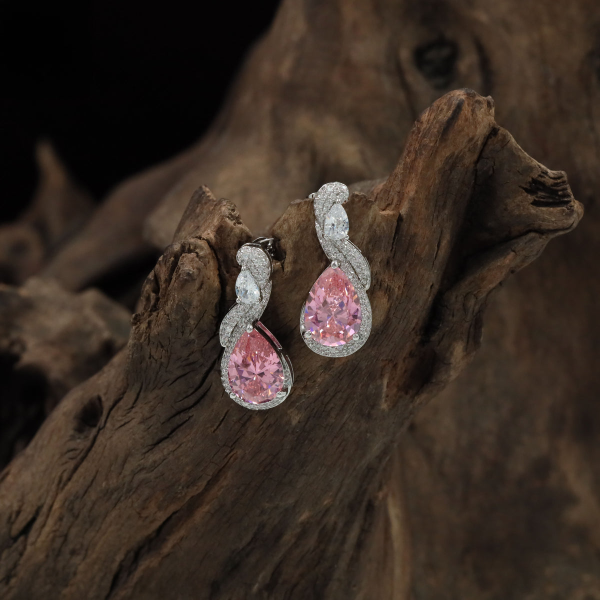 Contemporary Drop Rhodium Studs With Twisted Silhouette