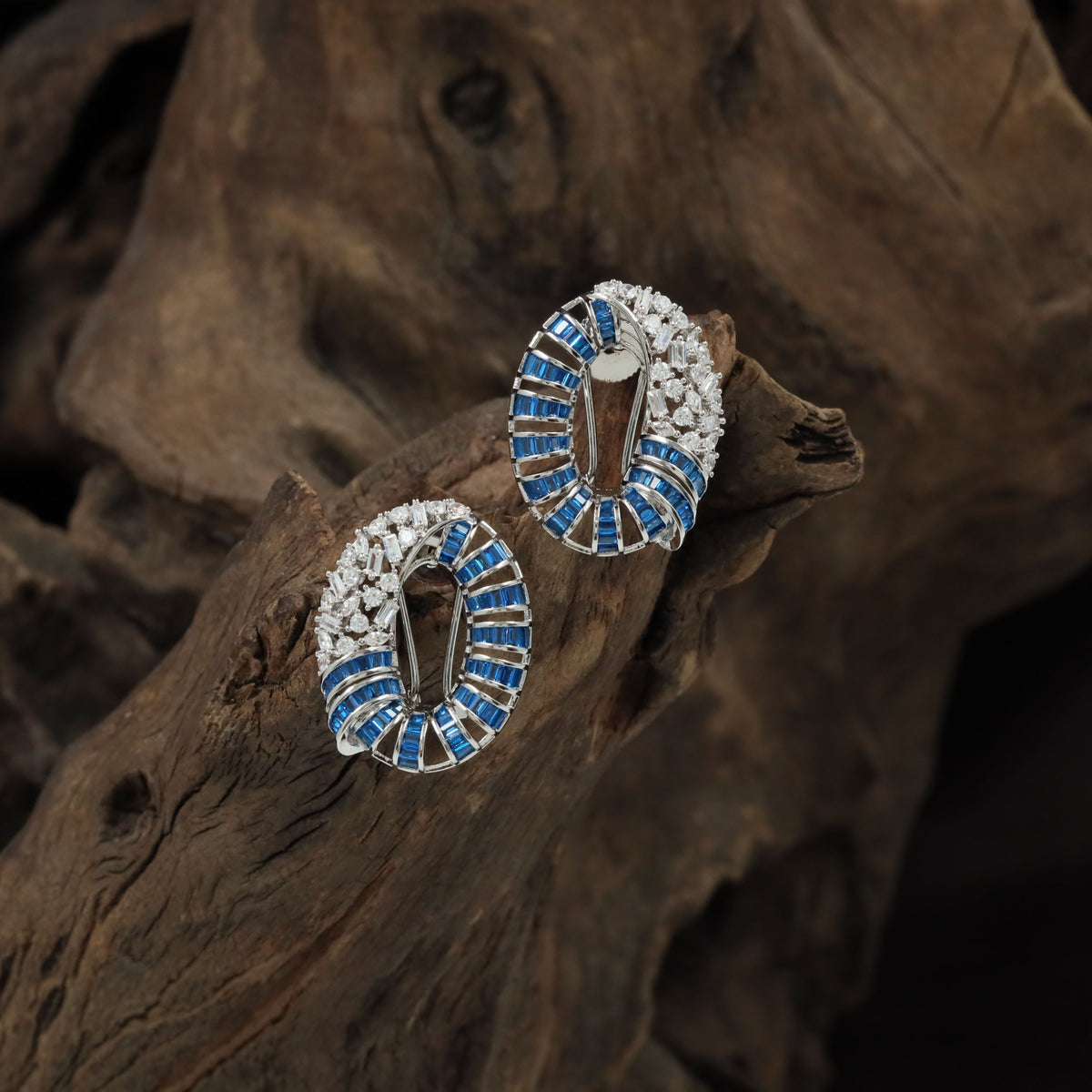 Elegant Rhodium Studs With Curved Geometric Patterns