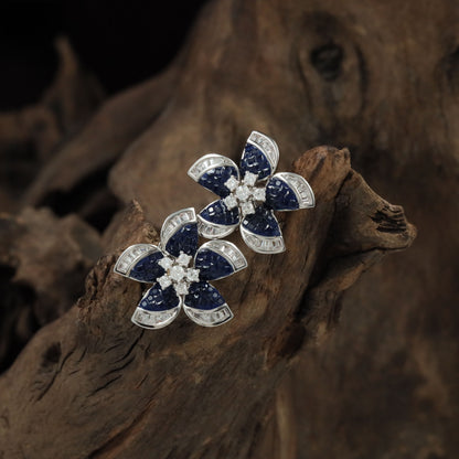 Premium Rhodium studs with intricate petal settings