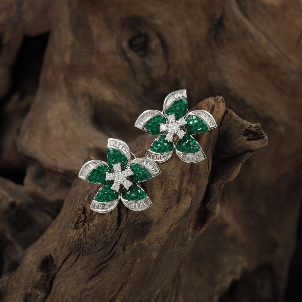 Premium Rhodium studs with intricate petal settings