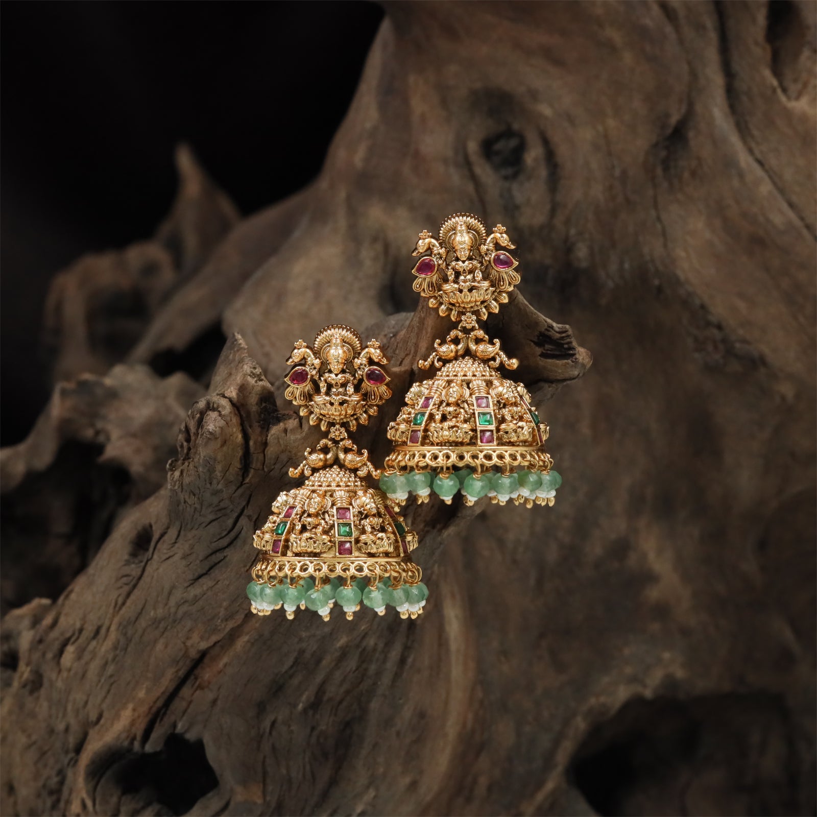 Floral Lakshmi Antique Jumka with Structured Temple Crown and Layered Surface Work