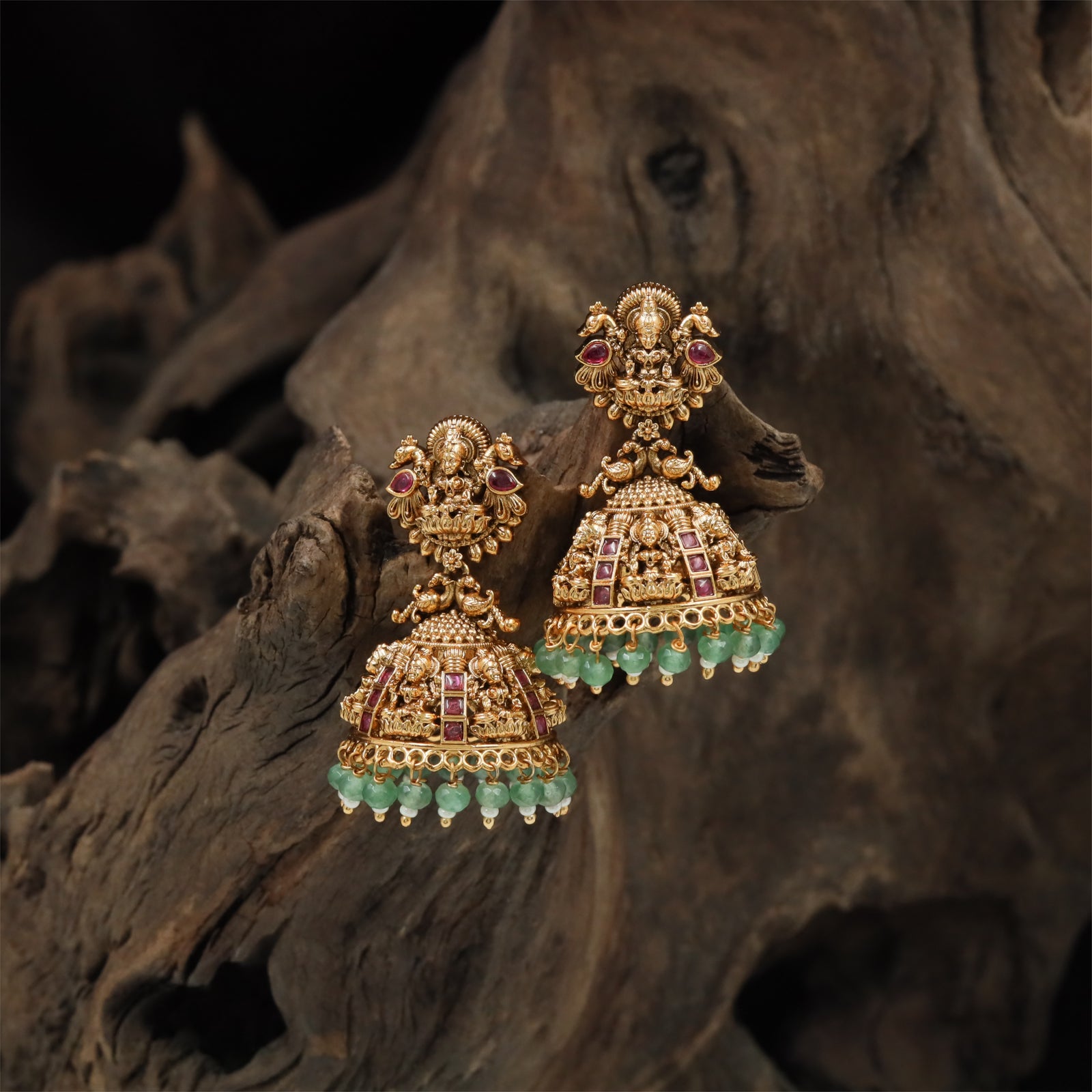 Floral Lakshmi Antique Jumka with Structured Temple Crown and Layered Surface Work