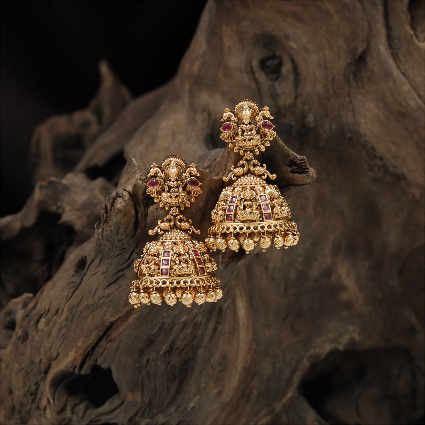 Floral Lakshmi Antique Jumka with Structured Temple Crown and Layered Surface Work