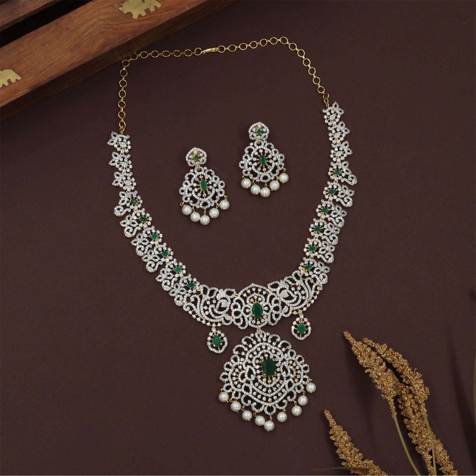 Majestic Gj Necklace with Circular Crystal Layout and Pendant Drop Borders