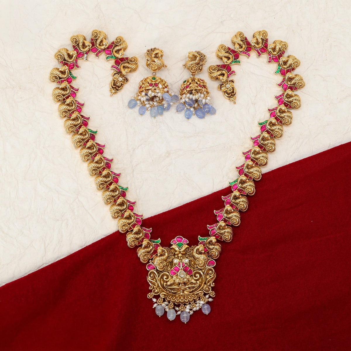 Classic Kempu Long Haara With Intricate Peacock Arrangements