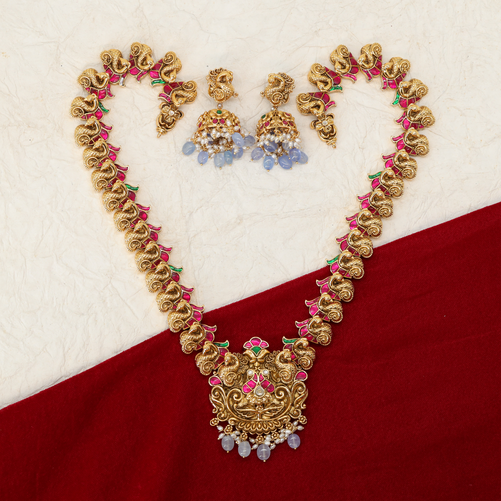 Peacock Link Long Haara with Carved Motifs and Deity Pendant