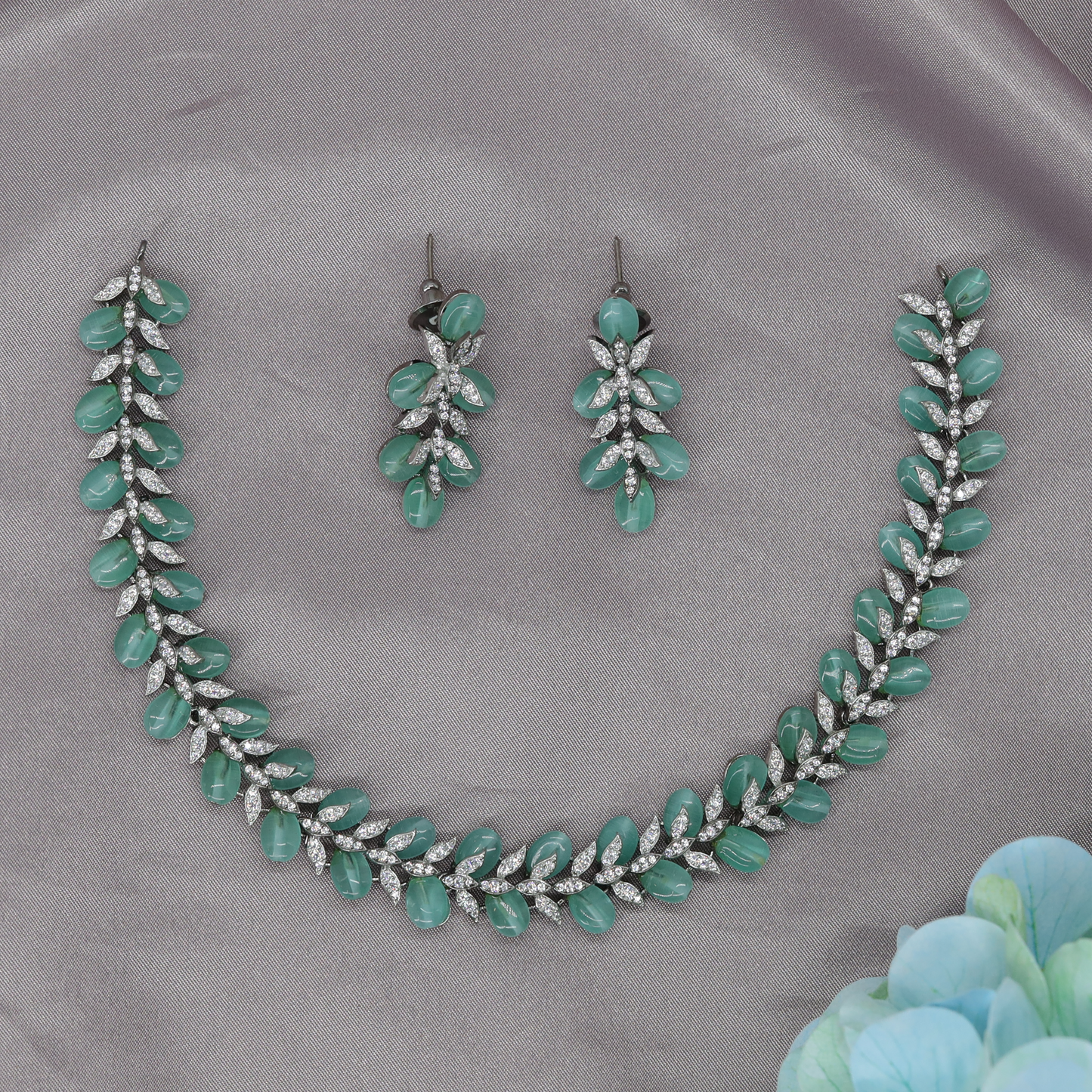 Fresh Leaf Drop Necklace with Clustered Petal Detailing and Matching Stud Earrings