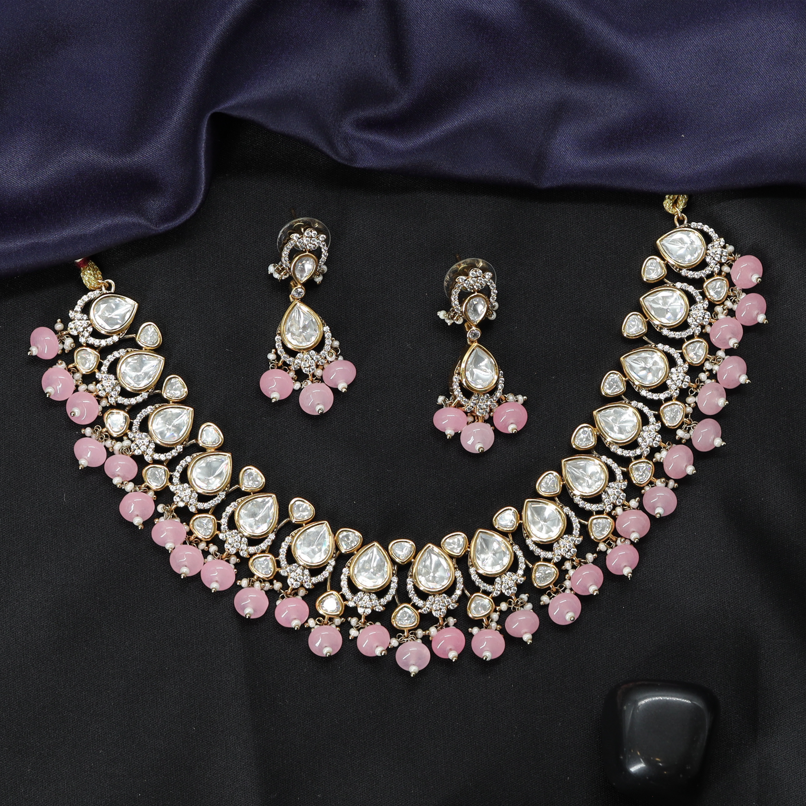Curved Motif Necklace with Repeating Teardrop Pattern and Beaded Fringe