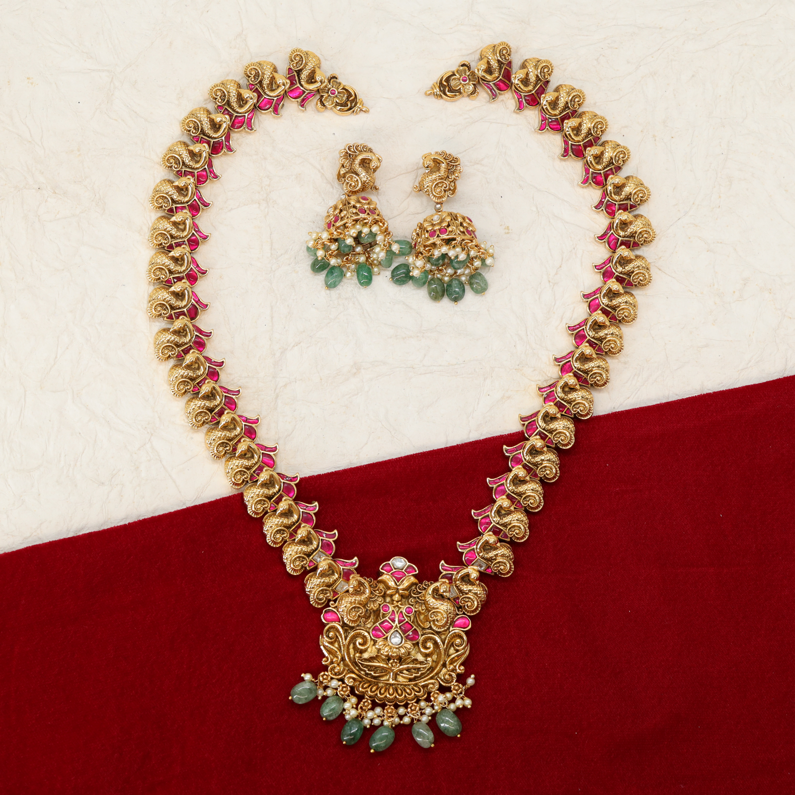 Flowing Peacock Motif Long Haara with Ornamental Centre Pendant and Drop Accents
