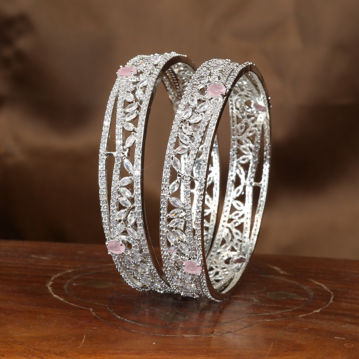 Whispering Leaf Pattern Rhodium Bangles with Open Frame Detailing