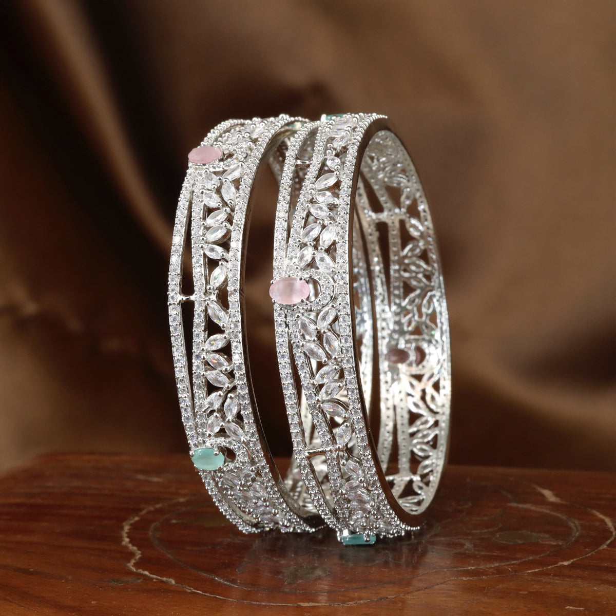 Elegant Rhodium Bangles Featuring Openwork Stone Patterns