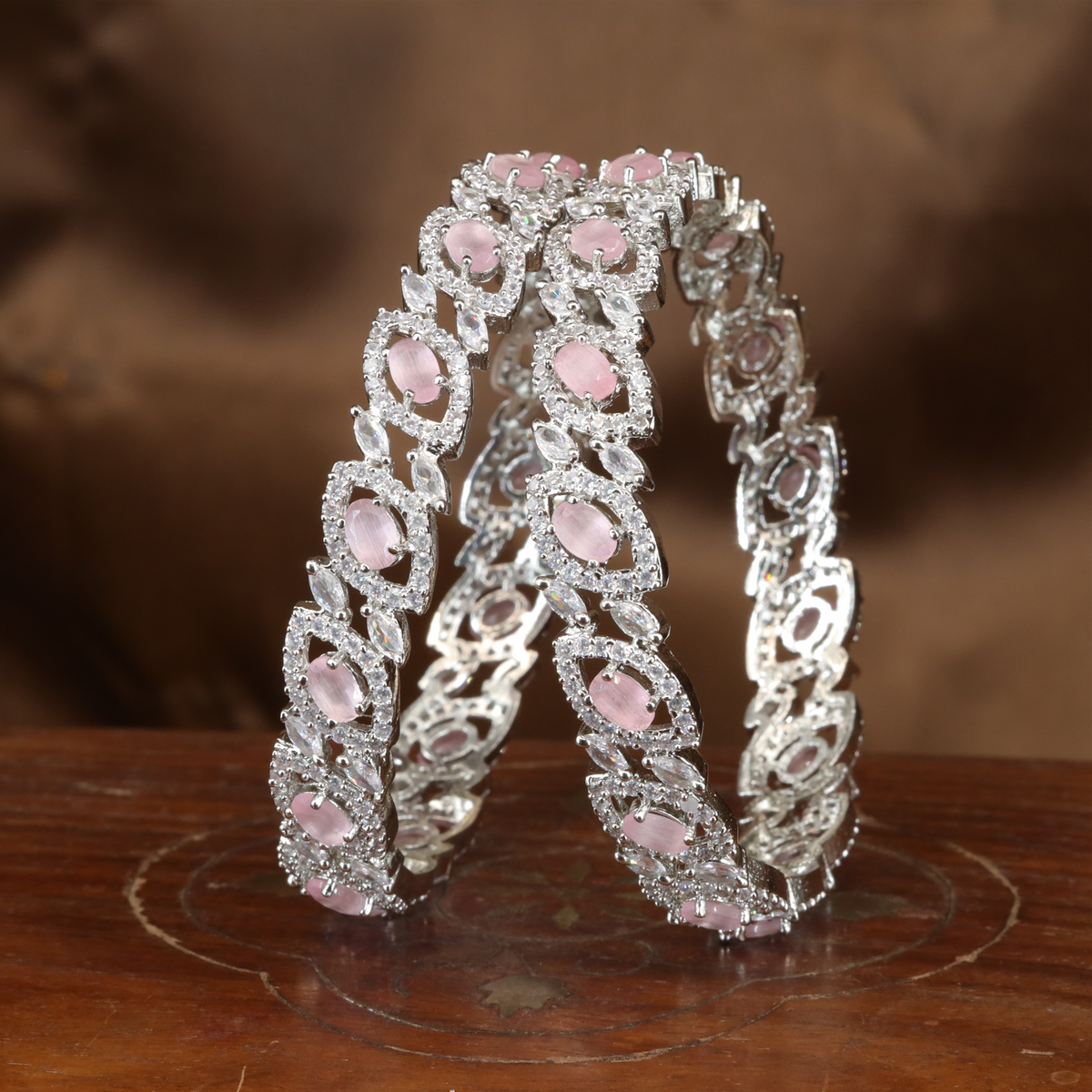 Radiant Vine Motif Rhodium Bangles with Structured Panel Design