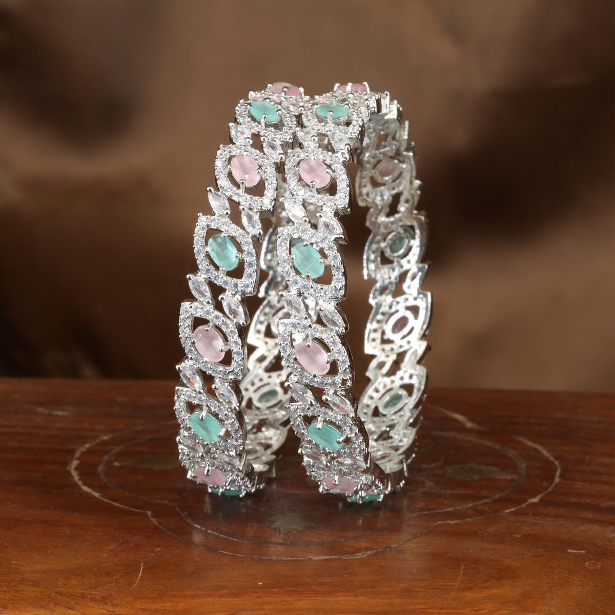 Radiant Vine Motif Rhodium Bangles with Structured Panel Design