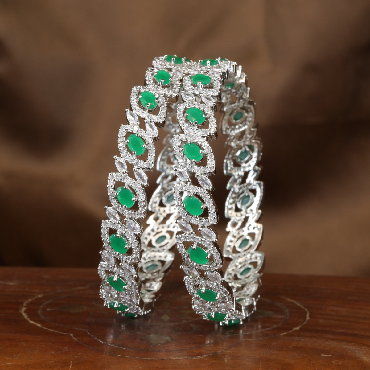 Radiant Vine Motif Rhodium Bangles with Structured Panel Design