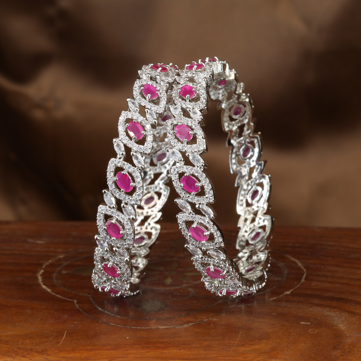 Radiant Vine Motif Rhodium Bangles with Structured Panel Design