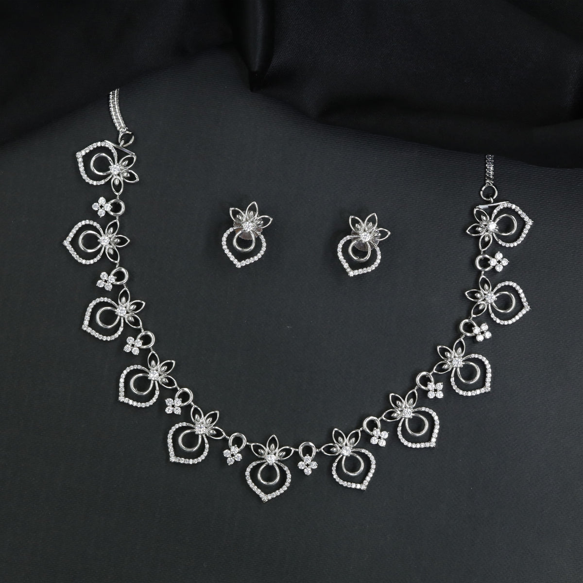 Premium Rhodium Necklace With Floral Stations And Drop Elements