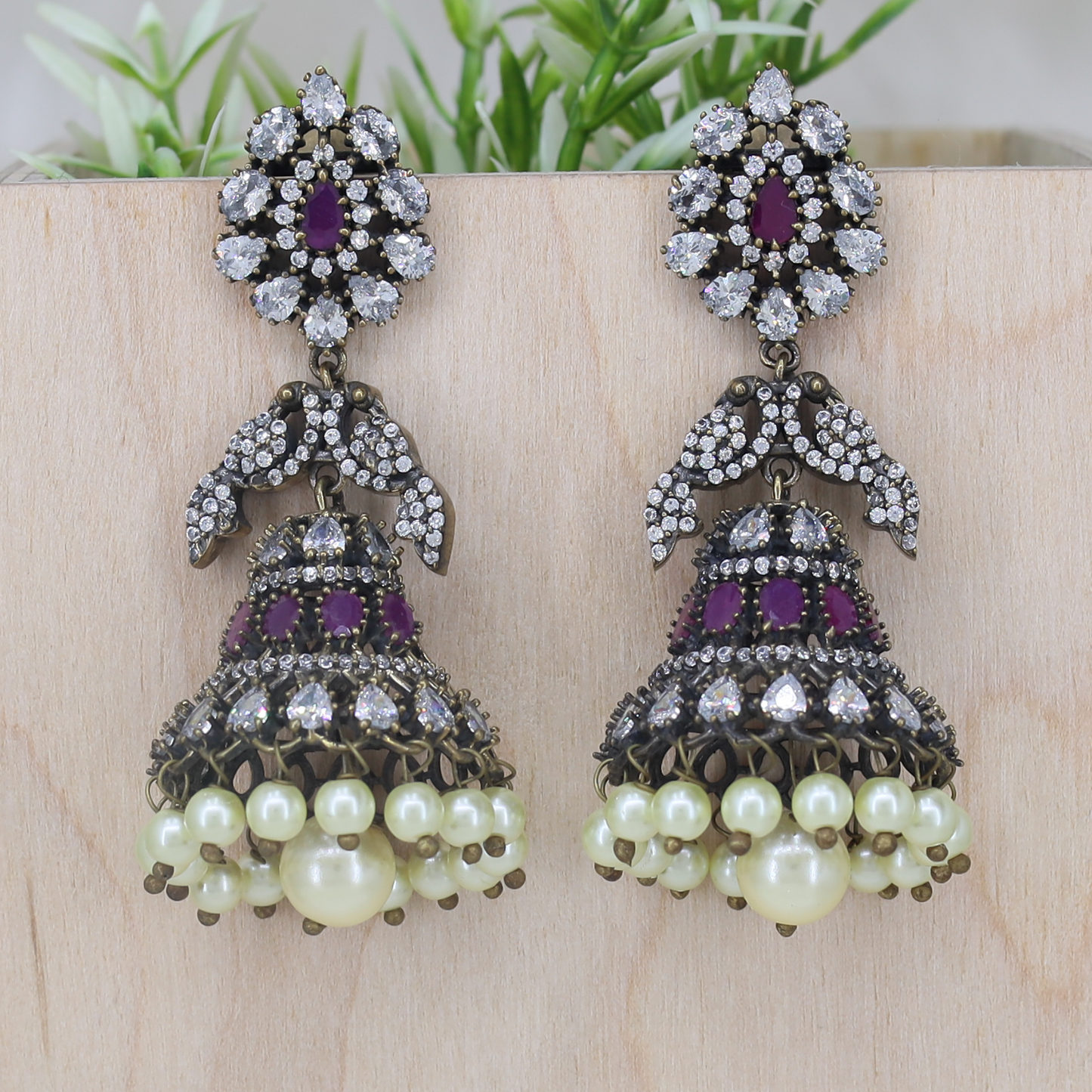 Decorative Floral Pattern Jhumka with Antique Finish and Dome Base