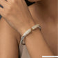 Modern Twisted Bracelet with Parallel PavÃ© Bars and Structured Open Design