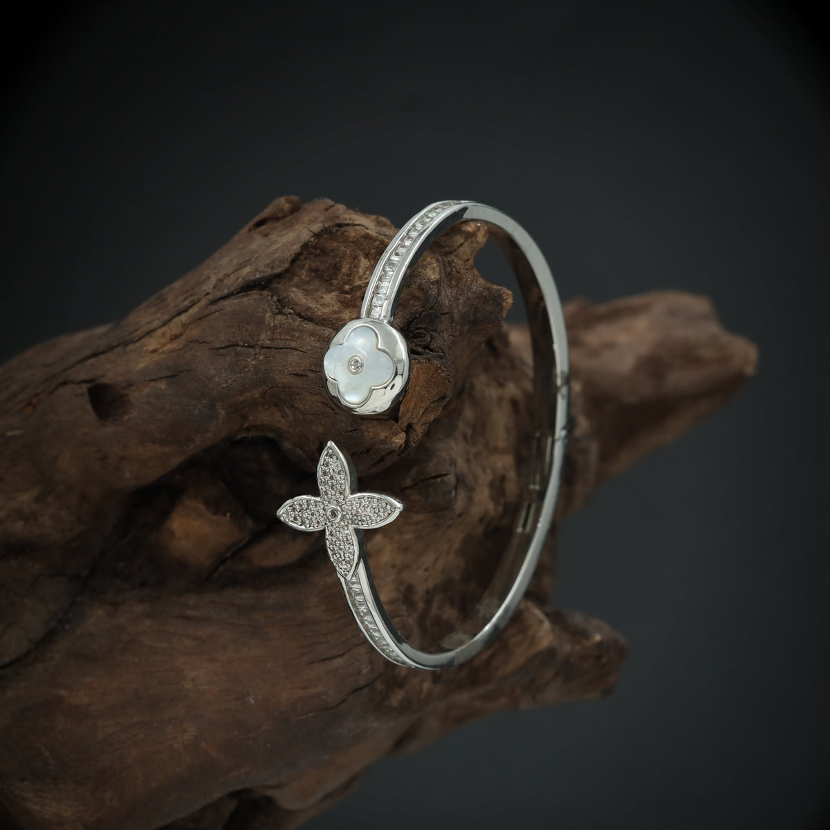 Sculpted Floral Bracelet with Dual Motif Placement and Slim Band Structure