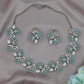 Elegant Floral Crytalstal Necklace Set with Leaf and Pearl Motif Design