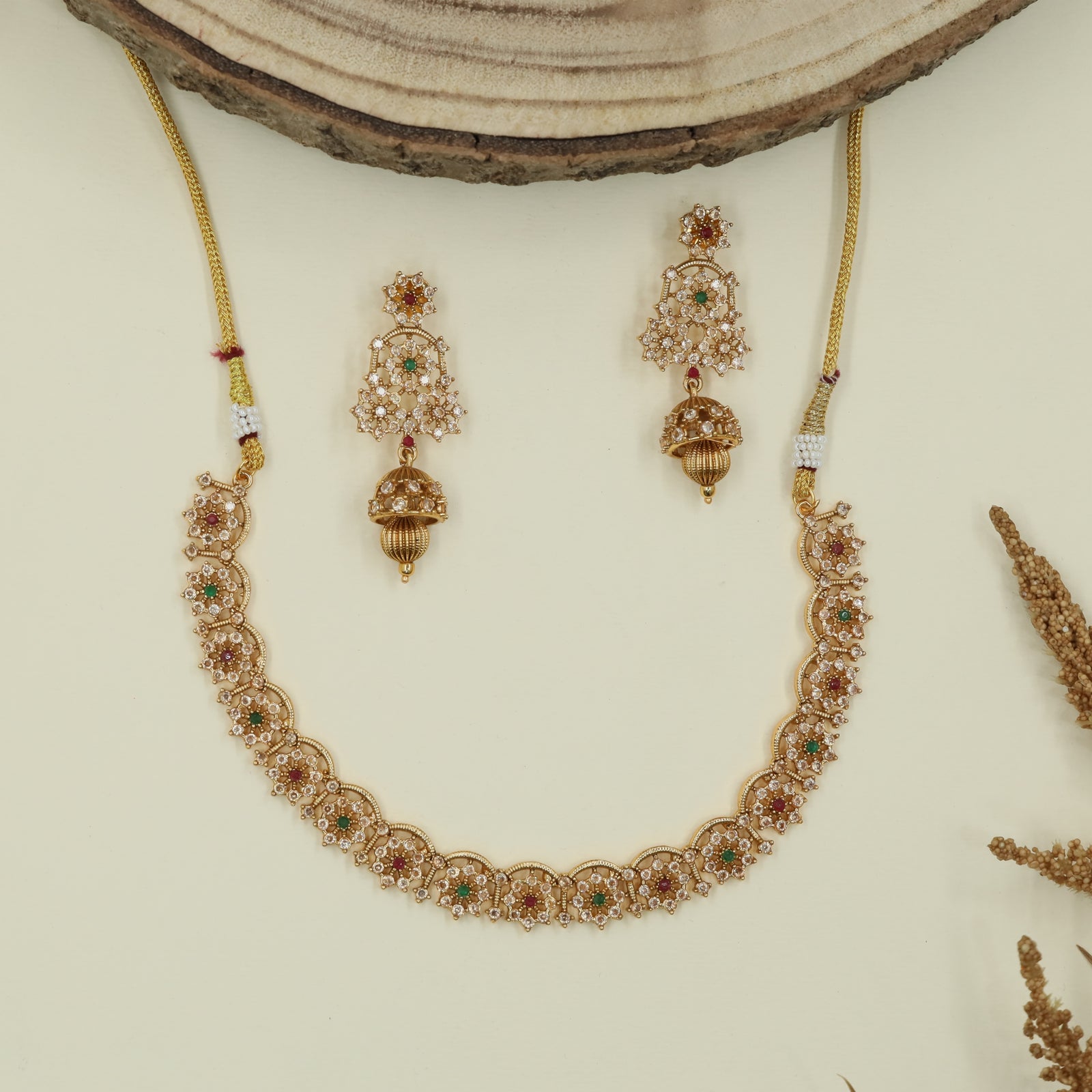 Scalloped floral antique necklace with repeating round panels and fine drop accents