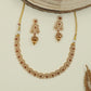 Scalloped floral antique necklace with repeating round panels and fine drop accents