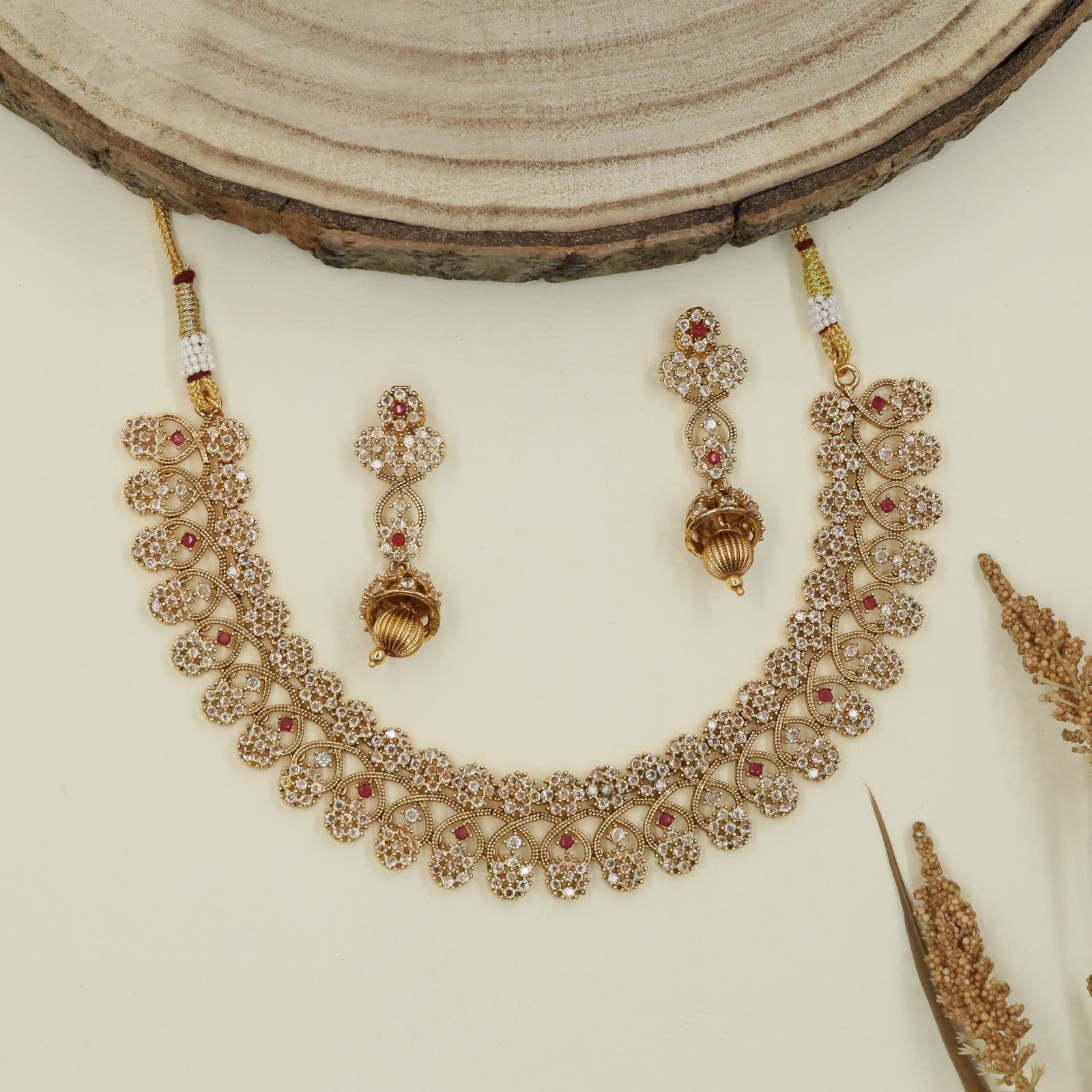 Vine pattern antique necklace with repeating floral clusters and fringe hangings