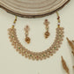 Vine pattern antique necklace with repeating floral clusters and fringe hangings